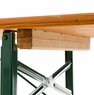The photo shows a close-up of the stacking ledge of a classic beer bench in pine.