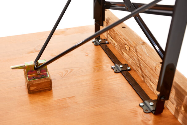 The image shows a close-up of the folding furniture lock of a Shorty beer tent set.