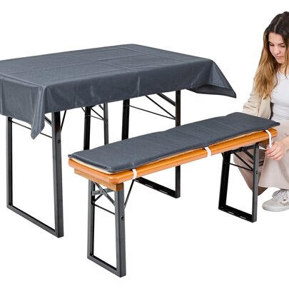 Woman attaches the bench cushion to the "Shorty" short beer tent set.