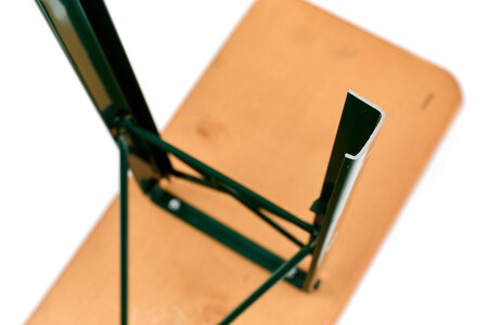 The C-shaped cross section of the base of the beer garden table sets