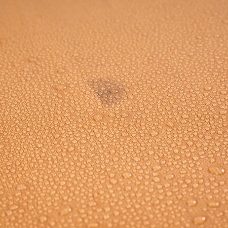 UV nano glaze of the beer garden table sets Beer garden table sets with water drops on the surface of the wood.