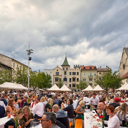 At Dine, Wine & Music, beer garden table sets were set up so that people could enjoy wine and food.