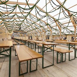 Classic beer garden table sets at Oktoberfest Classic beer garden table sets have been used at the Oktoberfest.