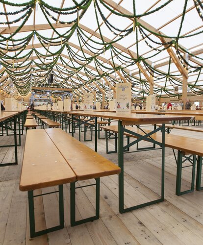 Classic beer garden table sets have been used at the Oktoberfest.